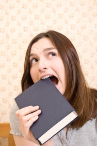 Young attractive woman with book